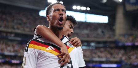Nmecha celebrates a goal scored against Curaçao