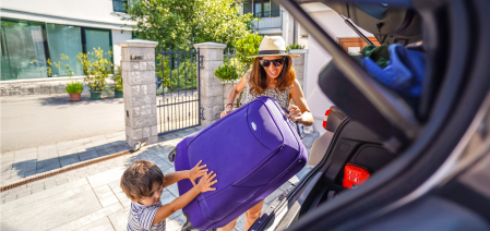 Family loading the car for vacation